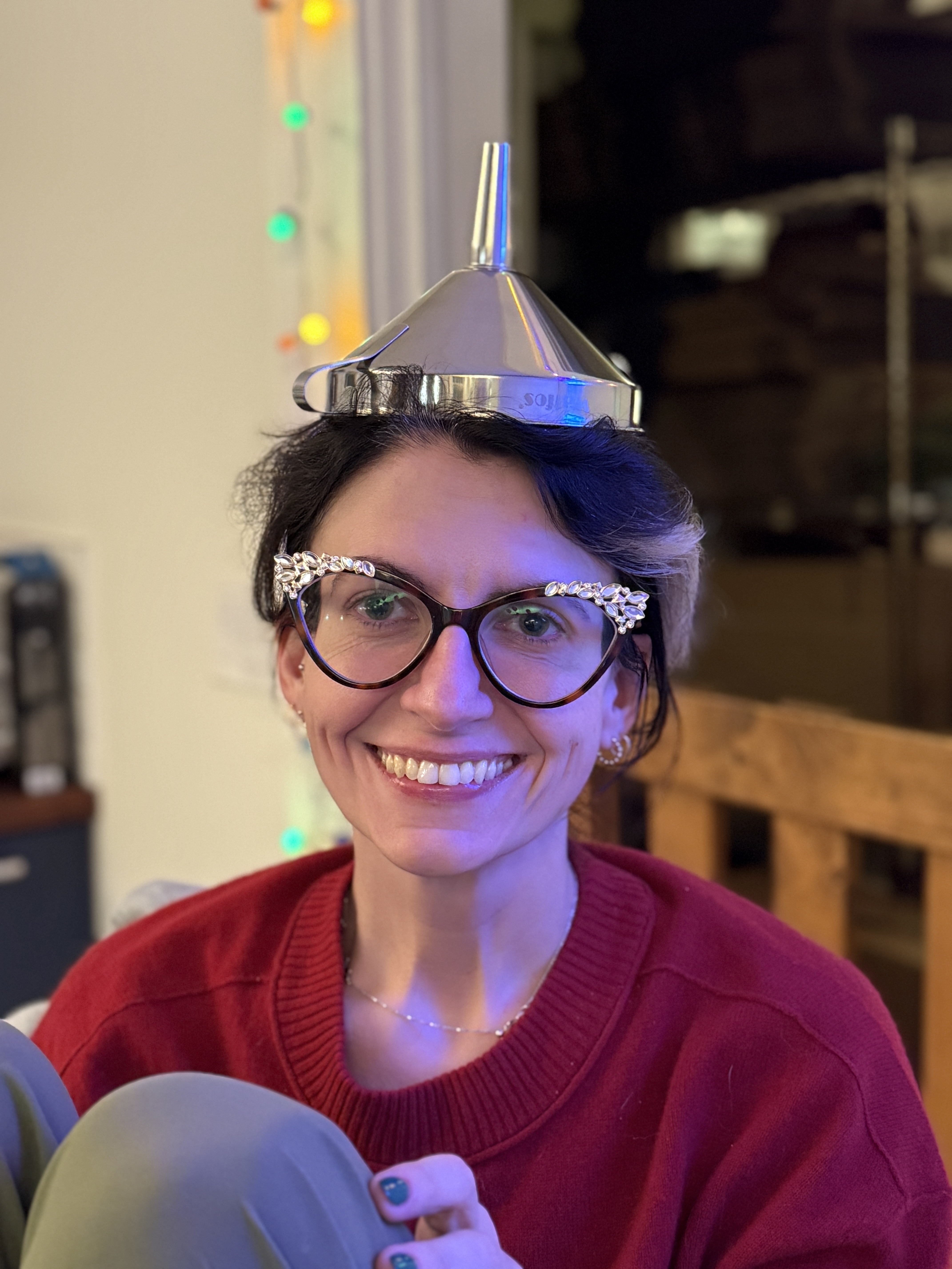 Sam wearing a funnel on her head